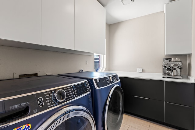 2600 Shadow Hill Ln, Plano, TX 75093 - laundry area featuring washing machine and clothes dryer and cabinet space
