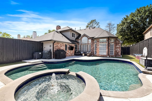 2600 Shadow Hill Ln, Plano, TX 75093 - view of pool featuring a pool with connected hot tub, a fenced backyard, area for grilling, and a patio area
