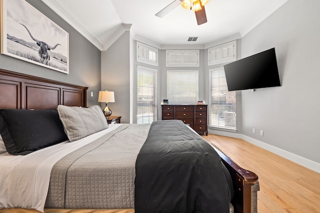 2600 Shadow Hill Ln, Plano, TX 75093 - bedroom featuring ornamental molding, wood finished floors, baseboards, and ceiling fan