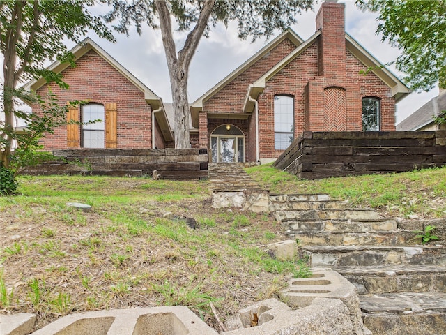 1120 Canyon Ridge Dr, Desoto, TX 75115 - view of front of house with brick siding and a chimney