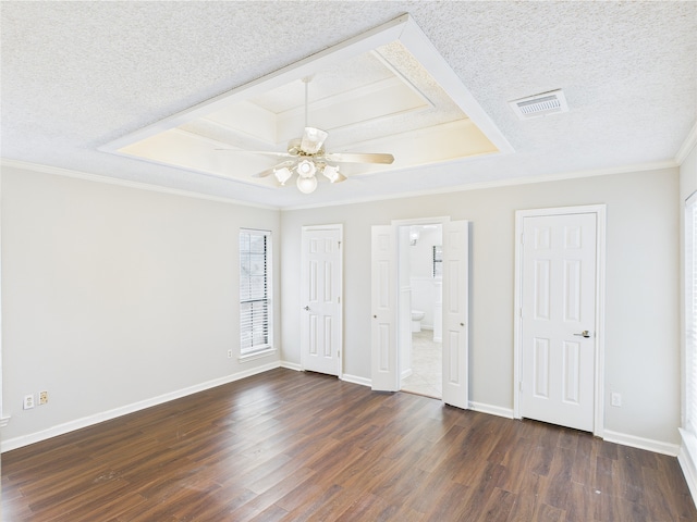 1120 Canyon Ridge Dr, Desoto, TX 75115 - unfurnished bedroom with dark wood-type flooring, ornamental molding, a textured ceiling, baseboards, and ceiling fan