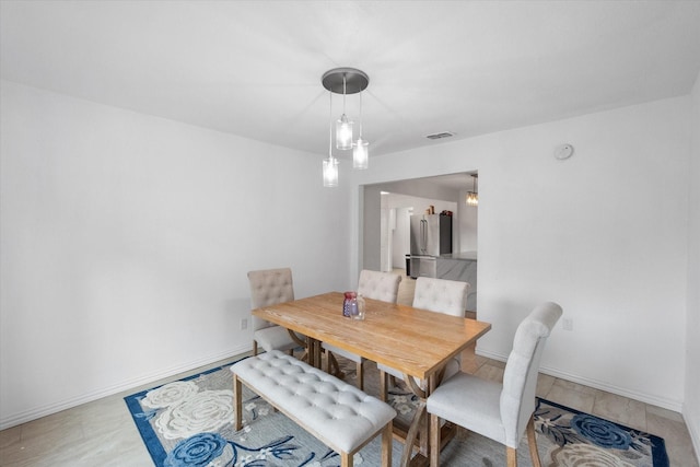 7209 W Cleburne Rd, Fort Worth, TX 76133 - dining room featuring baseboards