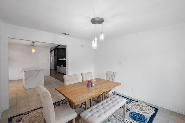 7209 W Cleburne Rd, Fort Worth, TX 76133 - dining area with baseboards
