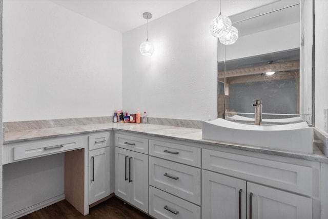 7209 W Cleburne Rd, Fort Worth, TX 76133 - bathroom featuring wood finished floors and a sink