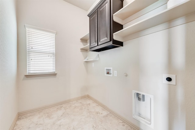9641 Calaveras Rd, Fort Worth, TX 76177 - laundry area with electric dryer hookup, washer hookup, hookup for a gas dryer, baseboards, and cabinet space