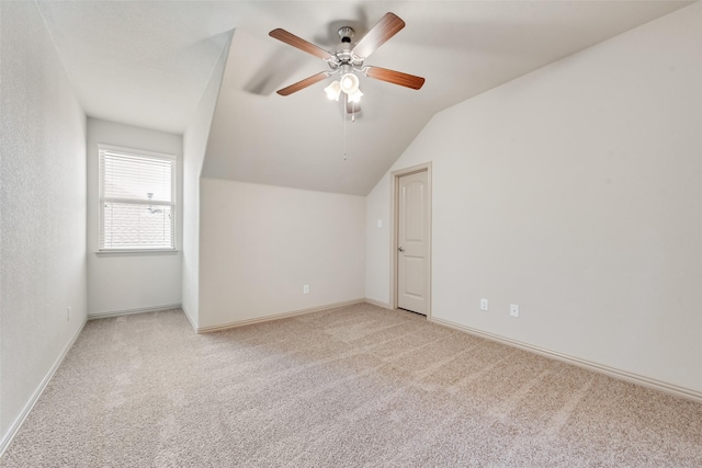 9641 Calaveras Rd, Fort Worth, TX 76177 - additional living space with light colored carpet, lofted ceiling, a ceiling fan, and baseboards