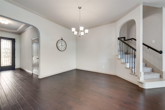 9641 Calaveras Rd, Fort Worth, TX 76177 - unfurnished room featuring dark wood-style floors, crown molding, stairs, a chandelier, and baseboards