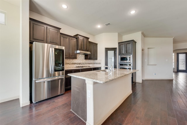 9641 Calaveras Rd, Fort Worth, TX 76177 - kitchen featuring stainless steel appliances, a sink, dark brown cabinets, backsplash, and dark wood-style flooring
