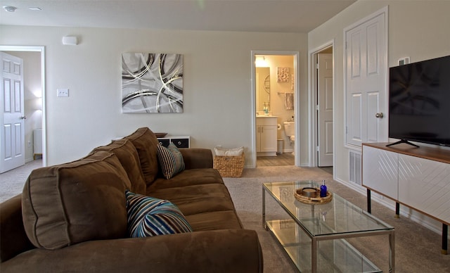 1438 Ganado Dr, Forney, TX 75126 - carpeted living area featuring baseboards