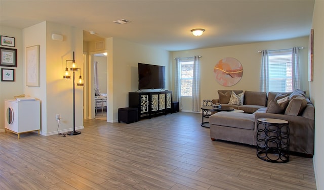 1438 Ganado Dr, Forney, TX 75126 - living area with light wood-style floors and baseboards