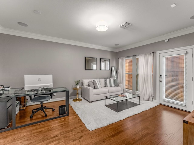 2917 Hallsville St, Dallas, TX 75204 - living room with ornamental molding, wood finished floors, an office area, and baseboards