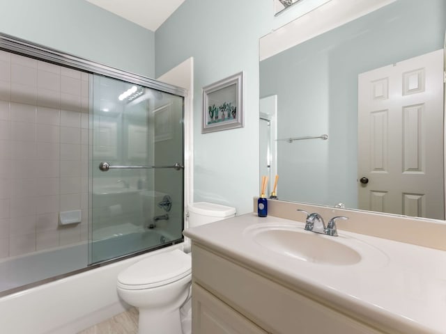2917 Hallsville St, Dallas, TX 75204 - full bathroom with toilet, vanity, and bath / shower combo with glass door