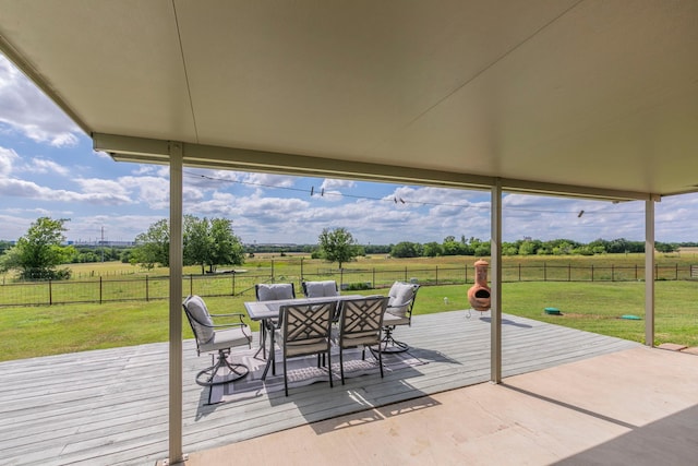 4260 Gun Club Rd, Temple, TX 76501 - view of patio featuring a wooden deck, outdoor dining space, and a rural view