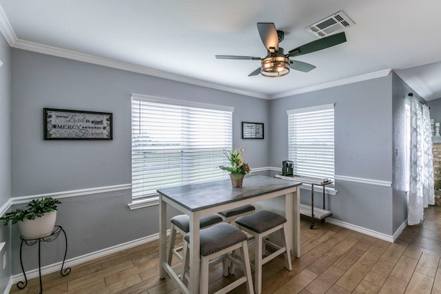 4260 Gun Club Rd, Temple, TX 76501 - dining space with a ceiling fan, light wood-type flooring, ornamental molding, and baseboards