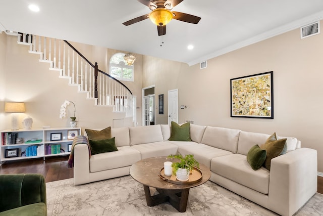 3601 Whitehaven Dr, Plano, TX 75093 - living room with stairs, recessed lighting, ceiling fan, wood finished floors, and crown molding