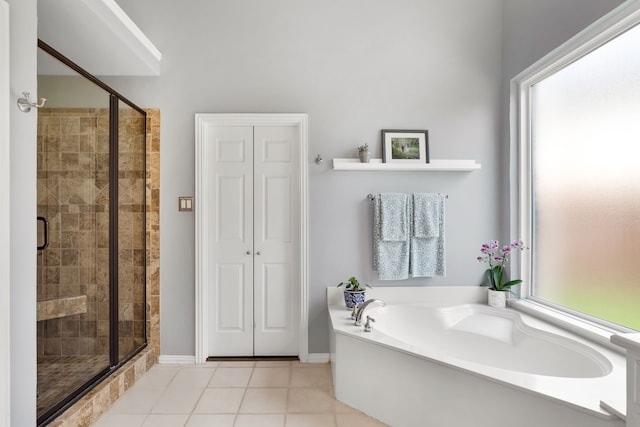 3601 Whitehaven Dr, Plano, TX 75093 - full bathroom featuring healthy amount of natural light, a garden tub, and a stall shower