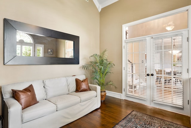 3601 Whitehaven Dr, Plano, TX 75093 - living area featuring wood finished floors, ornamental molding, and baseboards