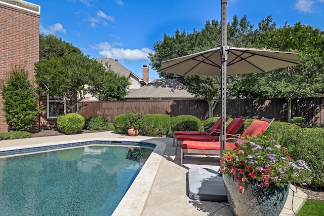 3601 Whitehaven Dr, Plano, TX 75093 - view of swimming pool with a fenced backyard and a patio area