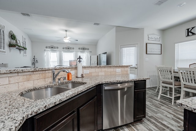 273 Pitt Cir, Fate, TX 75189 - kitchen featuring dishwasher, a sink, ceiling fan, tasteful backsplash, and plenty of natural light