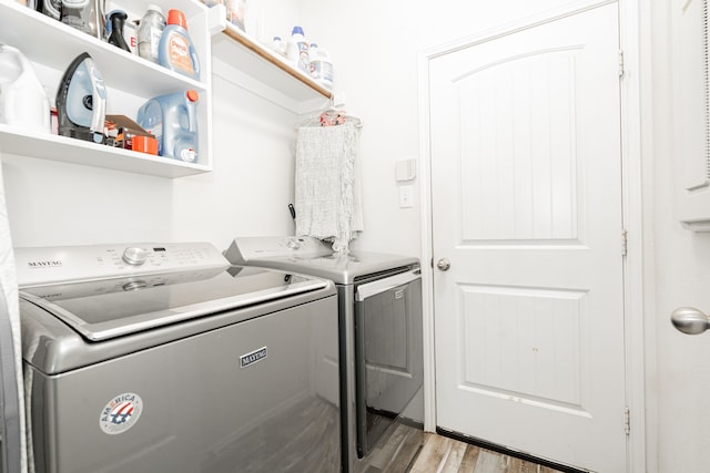 273 Pitt Cir, Fate, TX 75189 - washroom featuring washing machine and dryer and light wood-type flooring