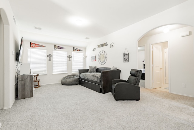 273 Pitt Cir, Fate, TX 75189 - living area featuring arched walkways, carpet, and baseboards
