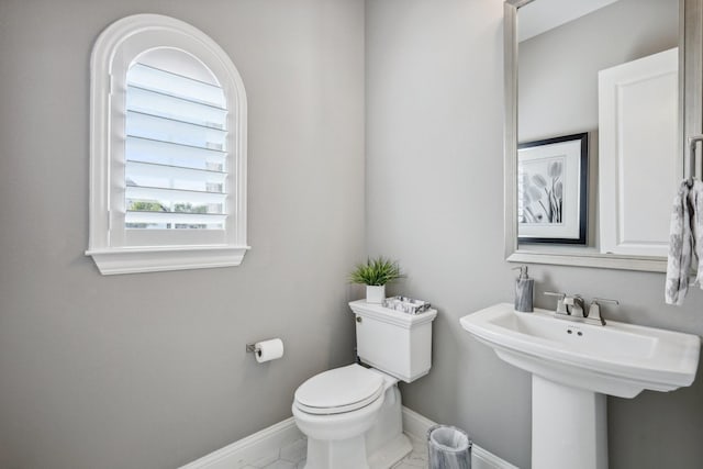 830 Country Brook Ln, Prosper, TX 75078 - bathroom with toilet, baseboards, and a sink
