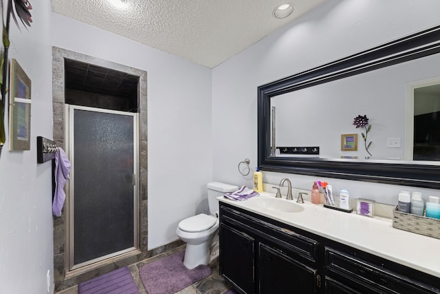 5501 Wood View St, North Richland Hills, TX 76180 - full bathroom with vanity, toilet, a shower stall, and a textured ceiling