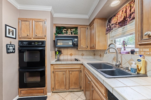 5501 Wood View St, North Richland Hills, TX 76180 - kitchen with black appliances, a sink, tile countertops, decorative backsplash, and light tile patterned flooring