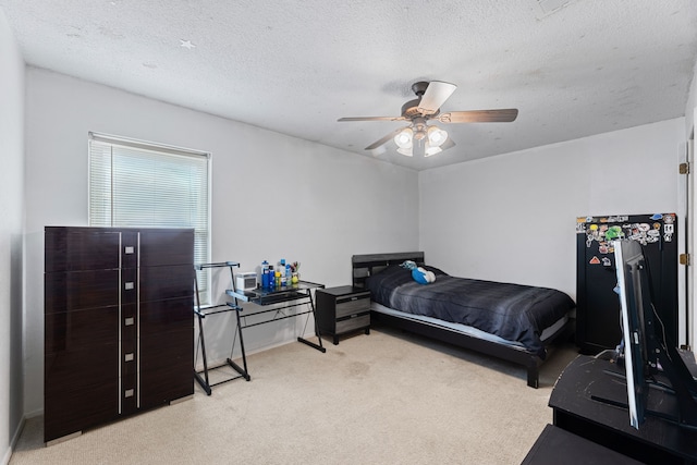 5501 Wood View St, North Richland Hills, TX 76180 - bedroom with light carpet, a textured ceiling, a ceiling fan, and baseboards