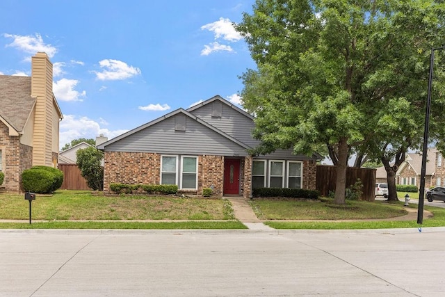 2502 Lake Valley Dr, Garland, TX 75040 - view of front of house featuring brick siding