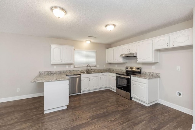 2502 Lake Valley Dr, Garland, TX 75040 - kitchen with stainless steel appliances, a peninsula, white cabinets, a sink, and a textured ceiling