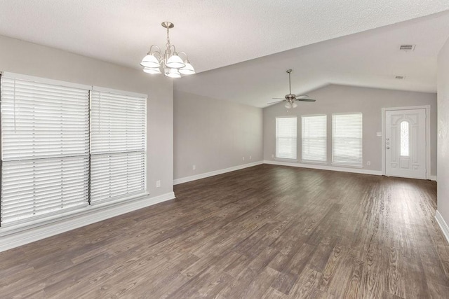 2502 Lake Valley Dr, Garland, TX 75040 - unfurnished living room with a chandelier, ceiling fan, baseboards, wood finished floors, and vaulted ceiling