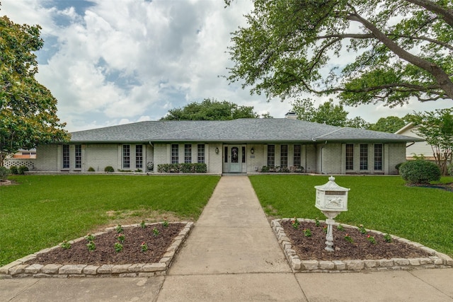 6921 Vineridge Dr, Dallas, TX 75248 - single story home with brick siding, a front yard, roof with shingles, and a chimney