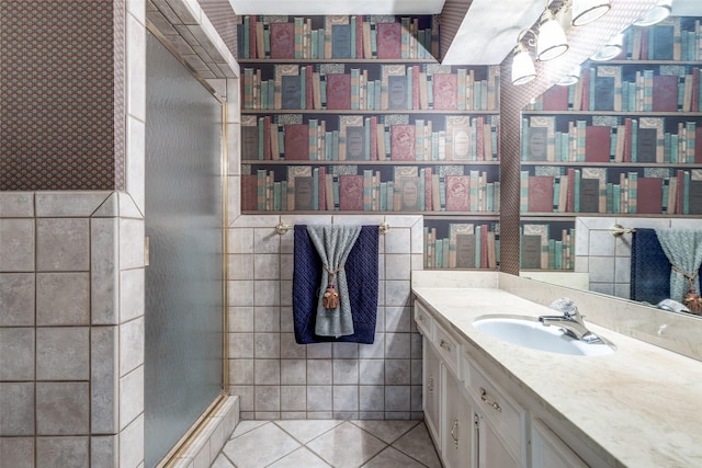 6921 Vineridge Dr, Dallas, TX 75248 - full bathroom with vanity, tile patterned flooring, and tile walls