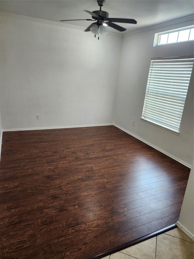 4026 Carrington Dr, Garland, TX 75043 - empty room featuring a ceiling fan, wood finished floors, crown molding, and baseboards