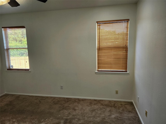 4026 Carrington Dr, Garland, TX 75043 - carpeted spare room featuring a ceiling fan and baseboards