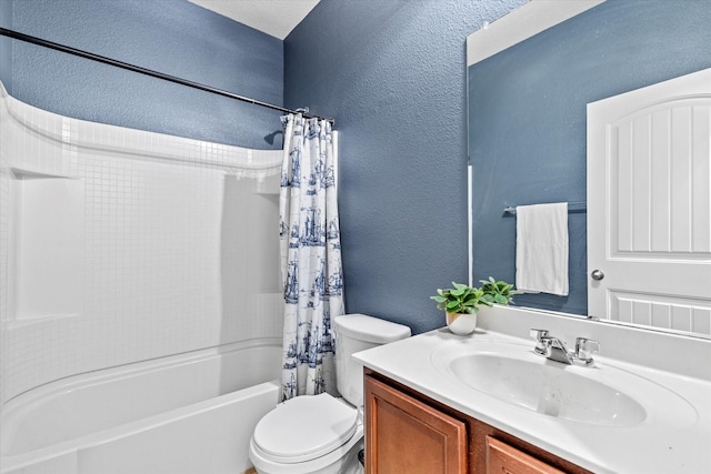9129 Blackstone Dr, Providence Village, TX 76227 - bathroom featuring a textured wall, toilet, shower / bath combination with curtain, and vanity