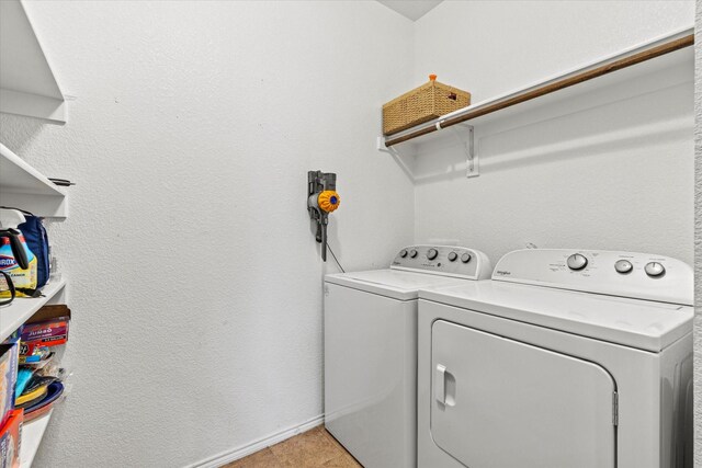 9129 Blackstone Dr, Providence Village, TX 76227 - laundry room featuring washing machine and clothes dryer