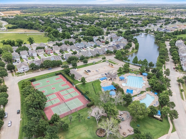 9129 Blackstone Dr, Providence Village, TX 76227 - aerial view of a pool area and a nearby body of water