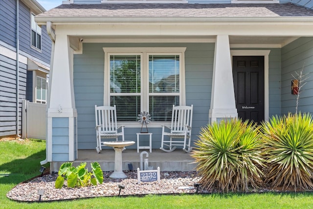 2132 Dewitt Ln, Providence Village, TX 76227 - entrance to property featuring a porch and a shingled roof