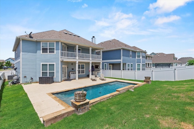 2132 Dewitt Ln, Providence Village, TX 76227 - back of property with a balcony and a patio