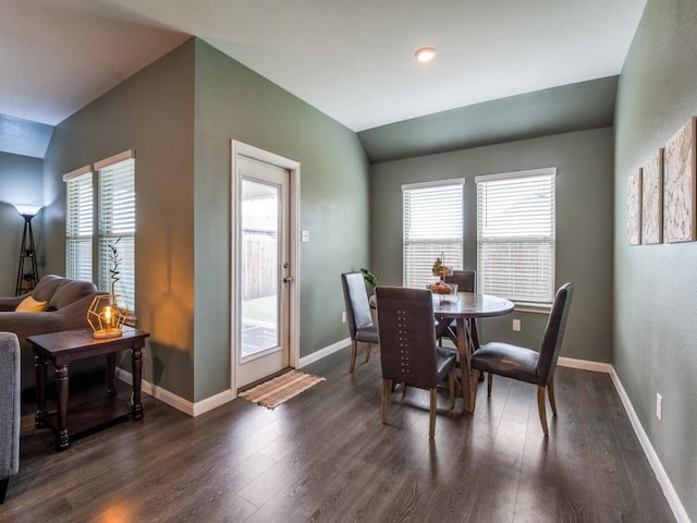 519 Stampede Ln, Princeton, TX 75407 - dining space featuring dark wood finished floors, lofted ceiling, and baseboards