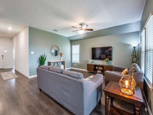 519 Stampede Ln, Princeton, TX 75407 - living area featuring dark wood-style floors, a ceiling fan, and baseboards