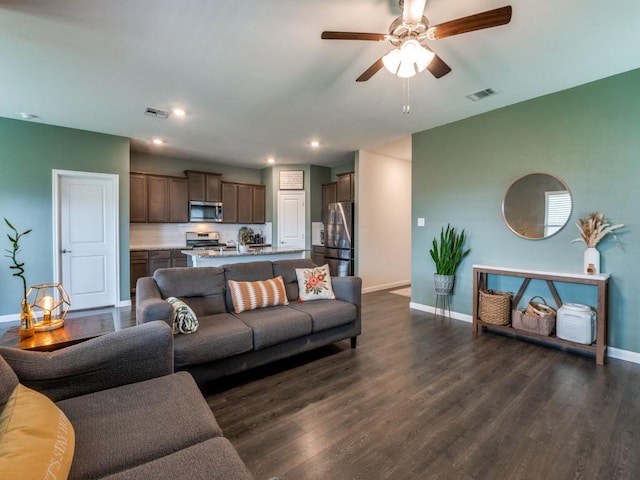 519 Stampede Ln, Princeton, TX 75407 - living room featuring baseboards, dark wood-style floors, and recessed lighting