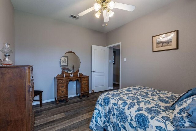 1551 Whiterock Dr, Midlothian, TX 76065 - bedroom featuring dark wood-style floors, baseboards, and a ceiling fan