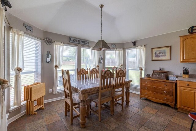 1551 Whiterock Dr, Midlothian, TX 76065 - dining space featuring healthy amount of natural light, baseboards, and stone tile flooring