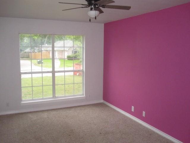 101 Ginger Dr, Pottsboro, TX 75076 - empty room with ceiling fan, baseboards, and carpet