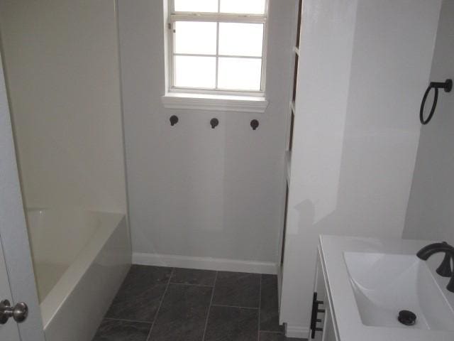 101 Ginger Dr, Pottsboro, TX 75076 - bathroom featuring vanity and baseboards