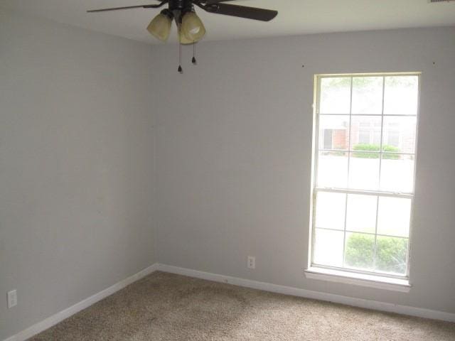 101 Ginger Dr, Pottsboro, TX 75076 - unfurnished room with ceiling fan, light colored carpet, and baseboards