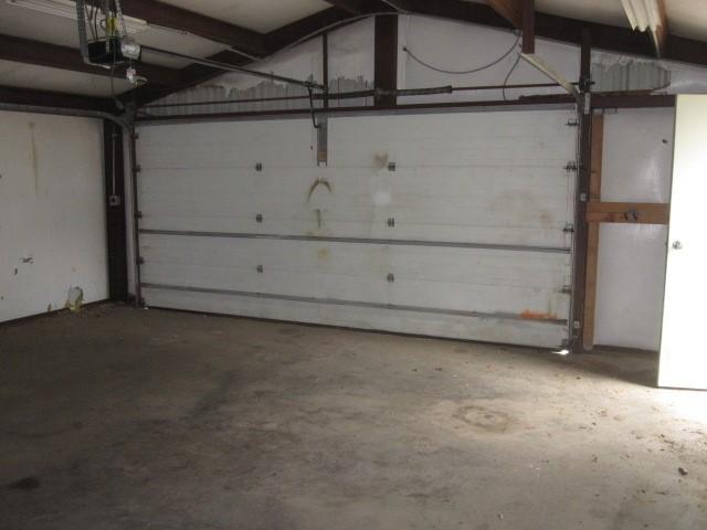 101 Ginger Dr, Pottsboro, TX 75076 - garage with a garage door opener